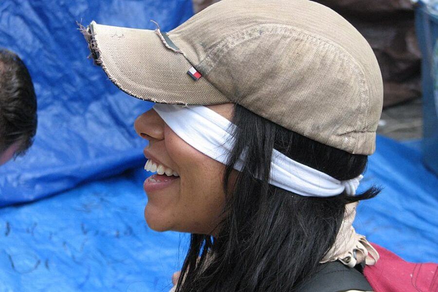 blinfolded smiling woman