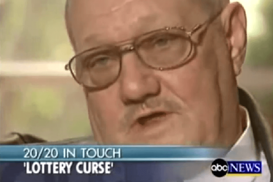 A close-up of an older man with glasses and a mustache speaking during an interview on ABC News' "20/20." The screen overlay reads "20/20 IN TOUCH 'LOTTERY CURSE'," suggesting a discussion about the negative consequences of winning the lottery. The image has a slightly grainy quality, characteristic of a television broadcast screenshot.