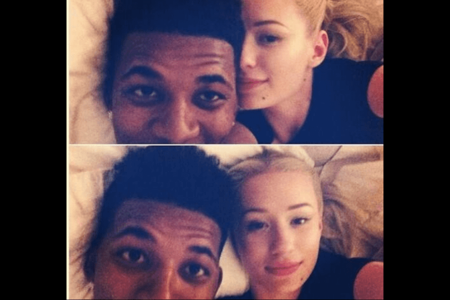 A two-panel collage of selfies featuring a man and a woman lying on a bed. In the top image, the man with short dark hair smiles playfully at the camera while the blonde woman rests her head against his, gazing softly. In the bottom image, both look directly at the camera with relaxed expressions. The setting is casual, with pillows visible in the background.