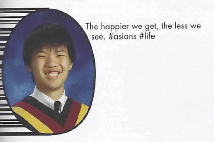 A high school yearbook photo of a young man with short black hair, smiling widely while wearing a graduation sweater with black, red, and yellow stripes over a white collared shirt and black tie. The yearbook quote beside him references happiness and visibility, accompanied by hashtags.