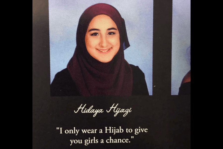 A high school yearbook photo of a young woman wearing a maroon hijab and a black outfit, smiling at the camera against a light blue background. Below her name, "Hidaya Hijazi," her yearbook quote humorously states, "I only wear a Hijab to give you girls a chance."