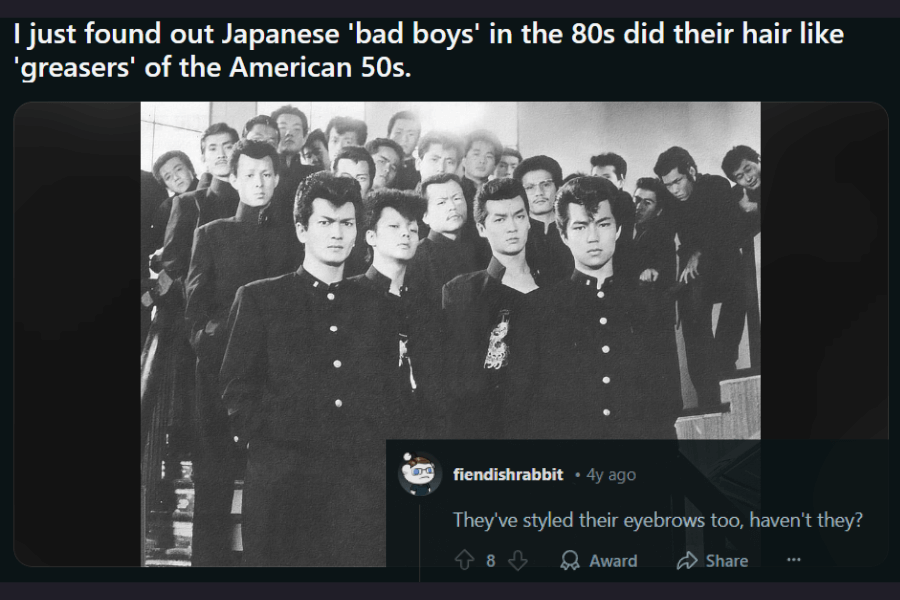 A black-and-white photograph of a group of Japanese delinquent youth from the 1980s, dressed in traditional black gakuran school uniforms. They sport exaggerated, greaser-inspired pompadour hairstyles, reminiscent of 1950s American rockabilly culture. A comment humorously points out that even their eyebrows appear to be styled, adding to the tough, rebellious aesthetic.