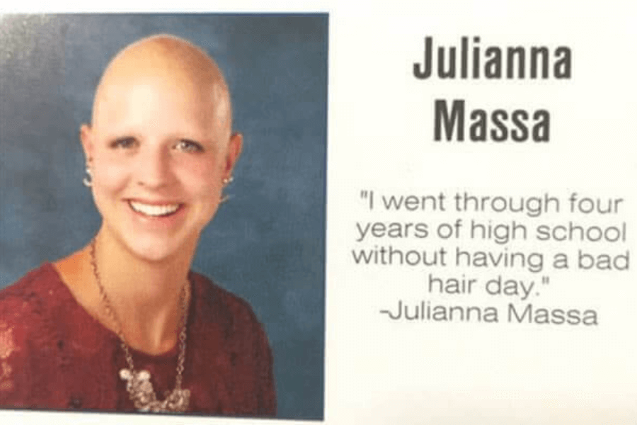 A high school yearbook photo of Julianna Massa, a young woman with a shaved head, wearing a red lace dress and a statement necklace. She is smiling, and her senior quote reads, "I went through four years of high school without having a bad hair day."