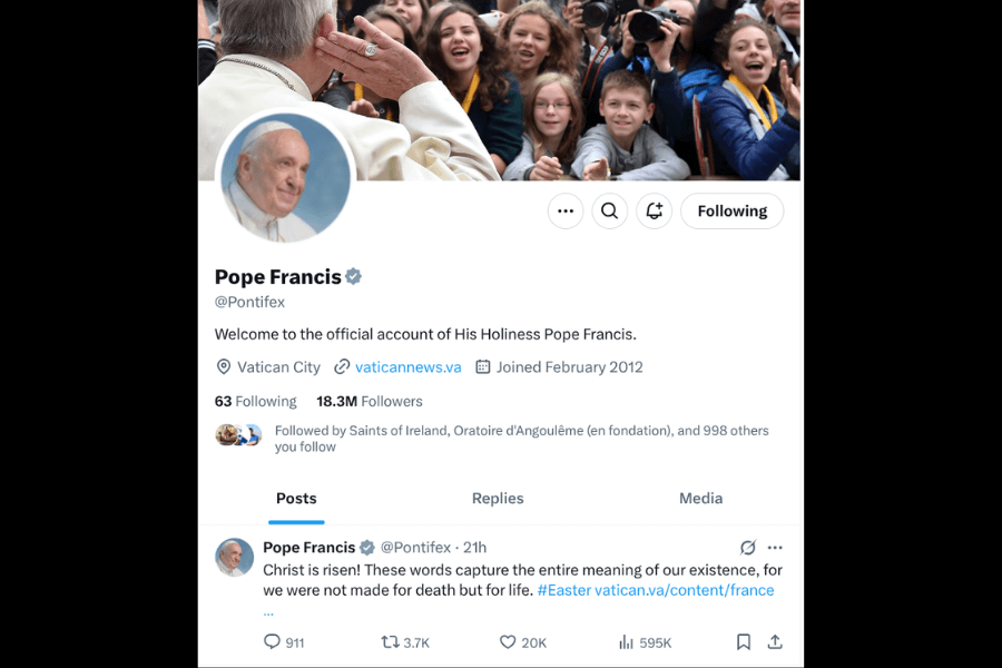 Screenshot of Pope Francis’ official Twitter profile (@Pontifex), showing his profile photo, a banner image of him greeting excited children, and a tweet reading: “Christ is risen! These words capture the entire meaning of our existence, for we were not made for death but for life. #Easter.” The account has 18.3 million followers and links to vaticannews.va.
