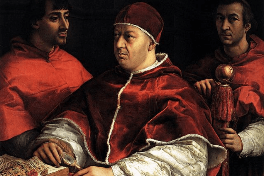 Renaissance-style painting of a pope seated in the center, wearing rich red and white ecclesiastical robes, flanked by two cardinals in red garments. The pope holds a magnifying glass, and the composition is dark and dramatic, emphasizing texture and expression.