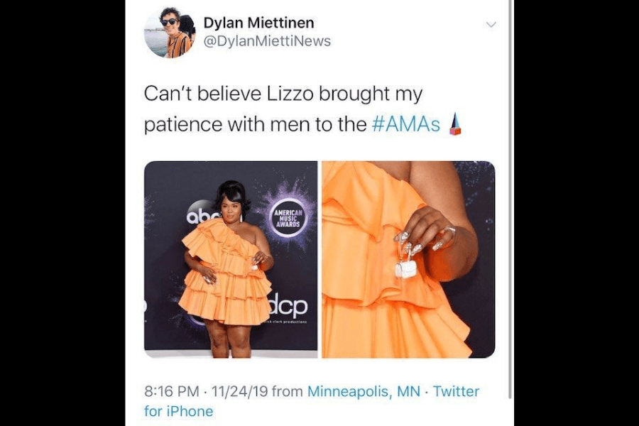A tweet from Dylan Miettinen reads, “Can’t believe Lizzo brought my patience with men to the #AMAs 💅.” Below it are two images of Lizzo at the 2019 American Music Awards: in the first, she poses in a ruffled orange mini dress; in the second, a close-up reveals she’s holding a comically tiny white handbag between her manicured fingers.