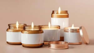 A group of candles sitting next to each other in glass jars