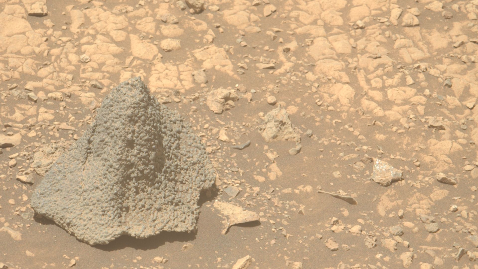 NASA rover on Mars capturing images of rocky terrain