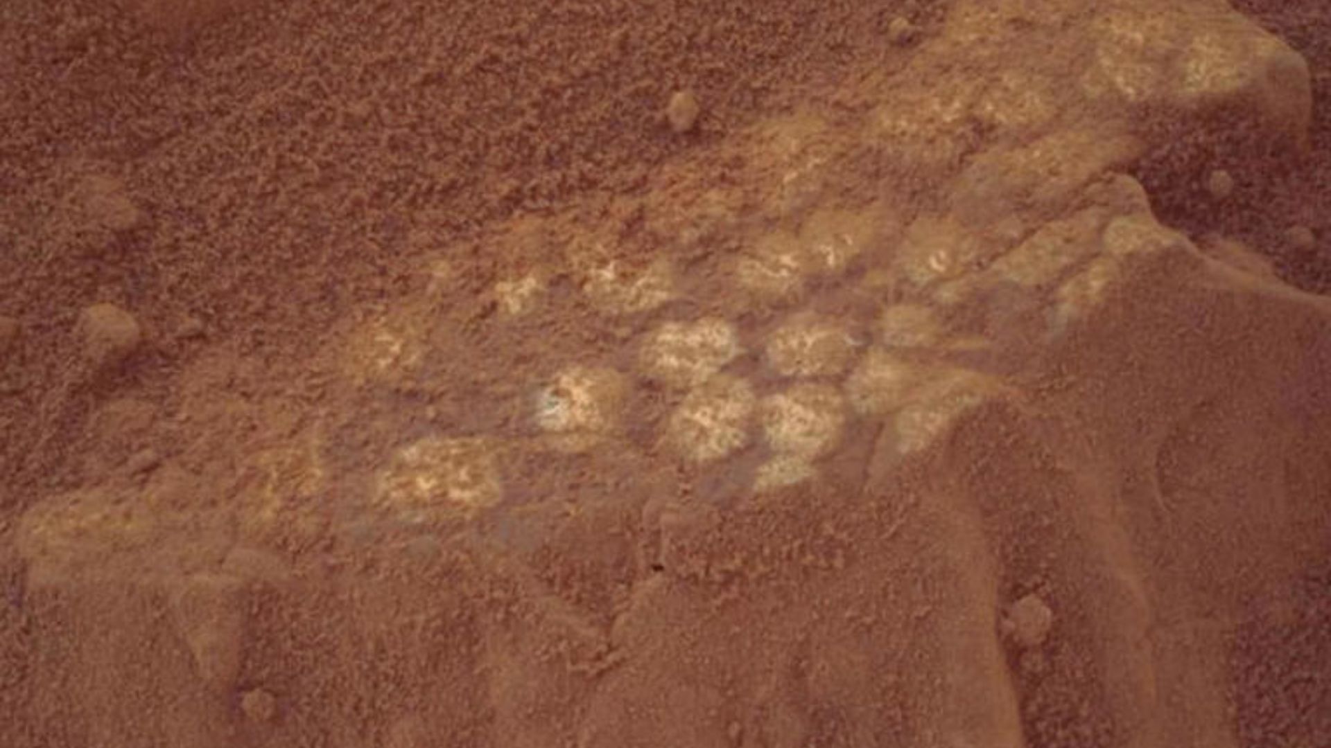 NASA Curiosity rover on the Martian surface capturing images of rocky terrain