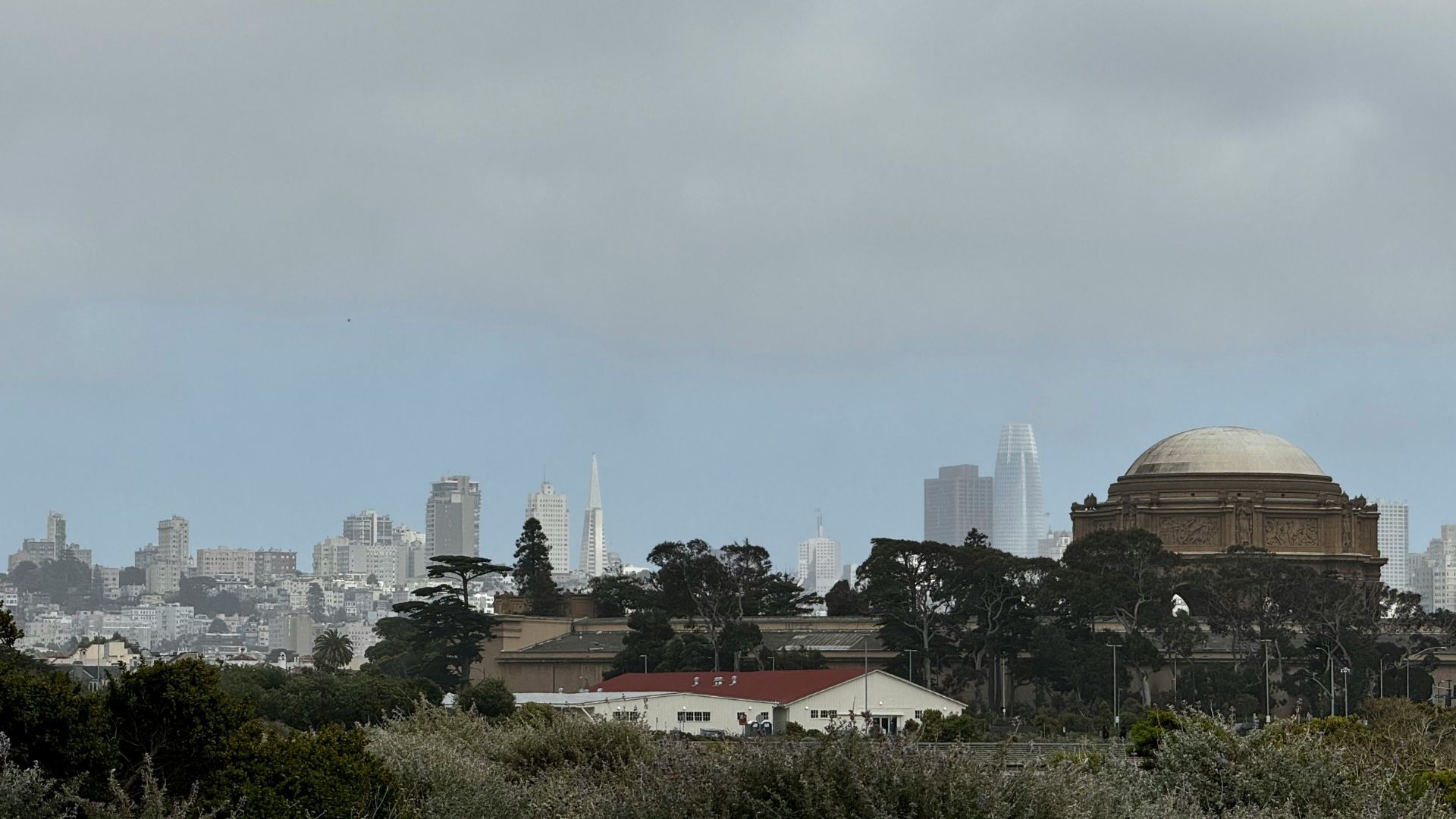 Distant view of a city with mountains in the background