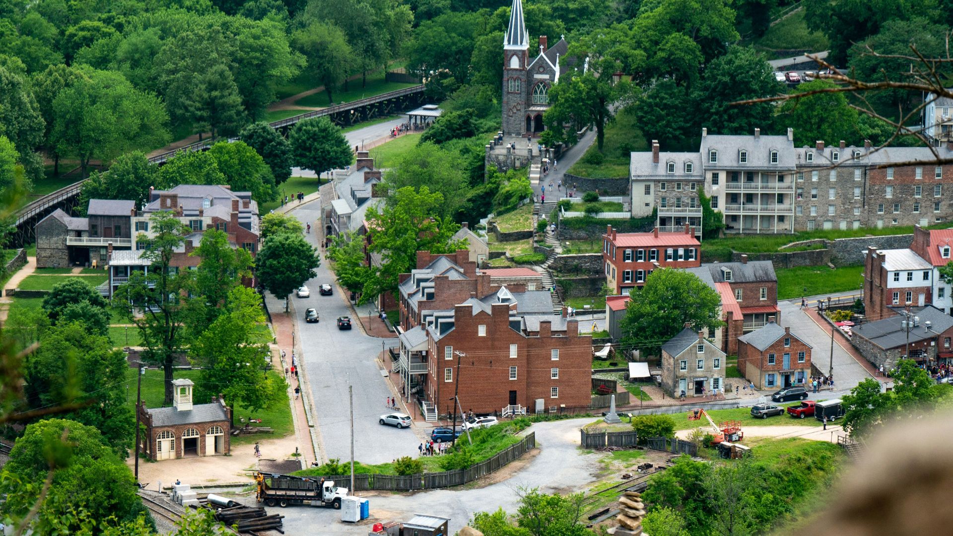 Trees surrounding a cathedral and nearby buildings in West Virginia