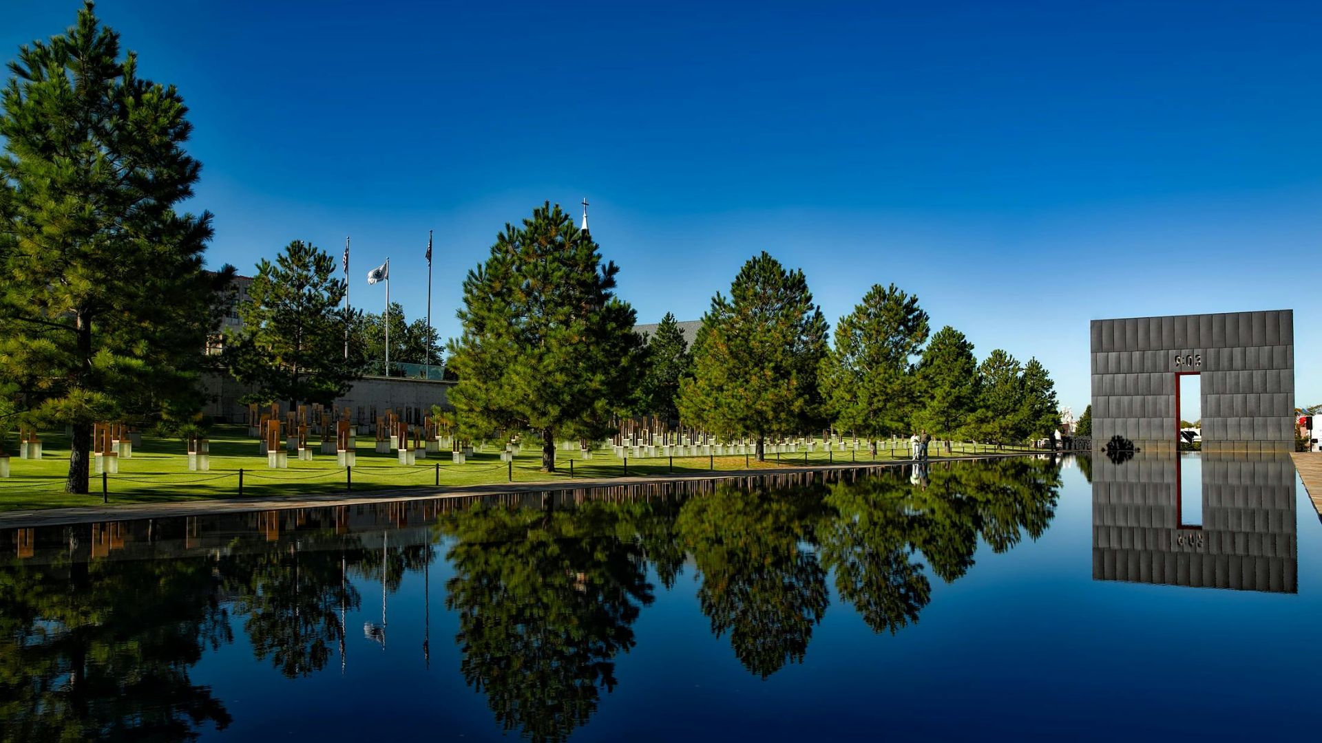 Calm body of water surrounded by greenery in Oklahoma