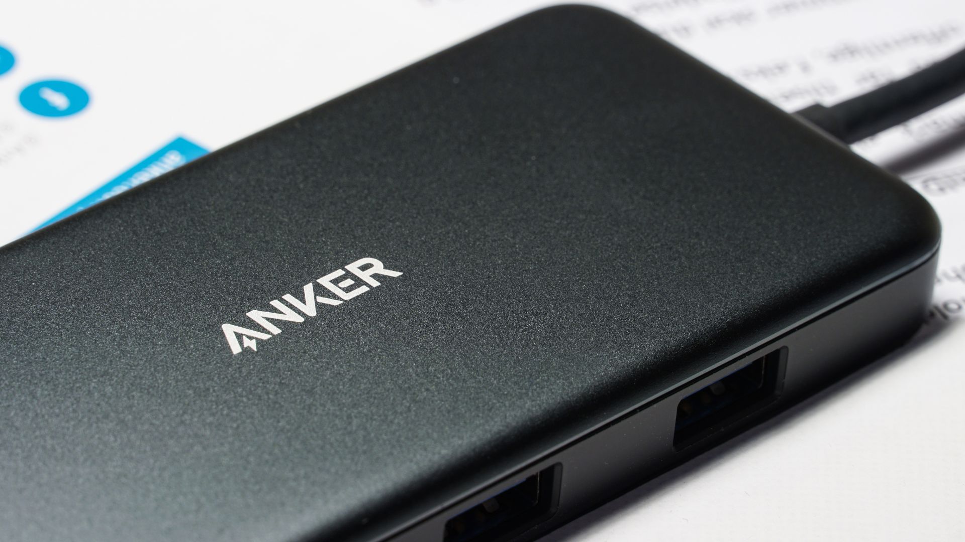 Logo of Anker, a Chinese electronics company, displayed on a wall