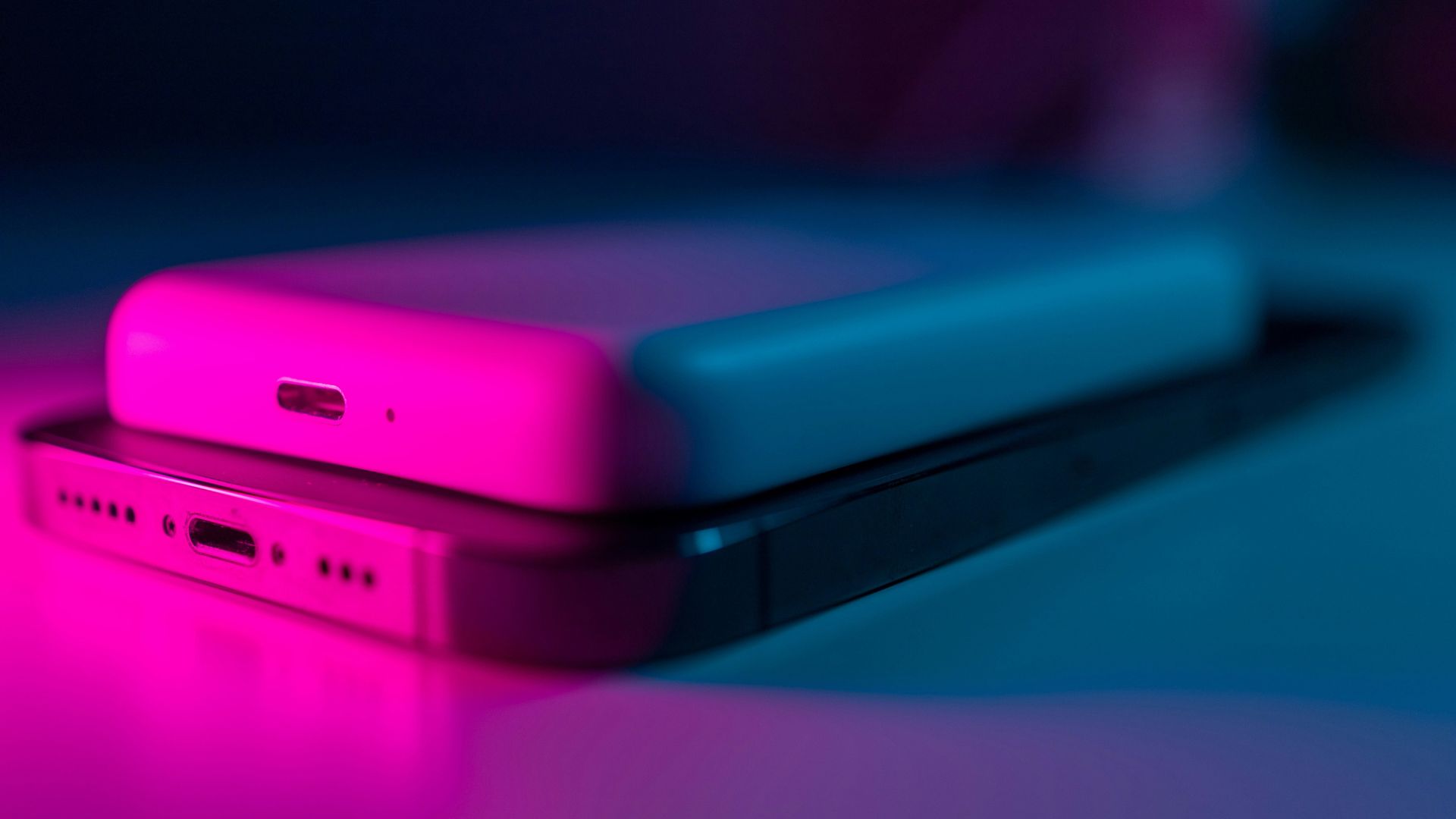 Two smartphones placed on a table