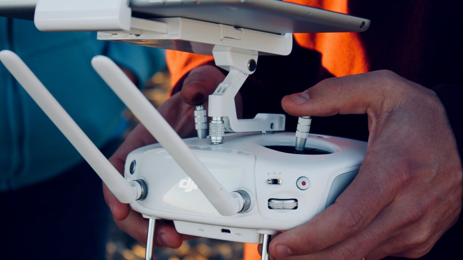 White DJI drone remote control during daytime