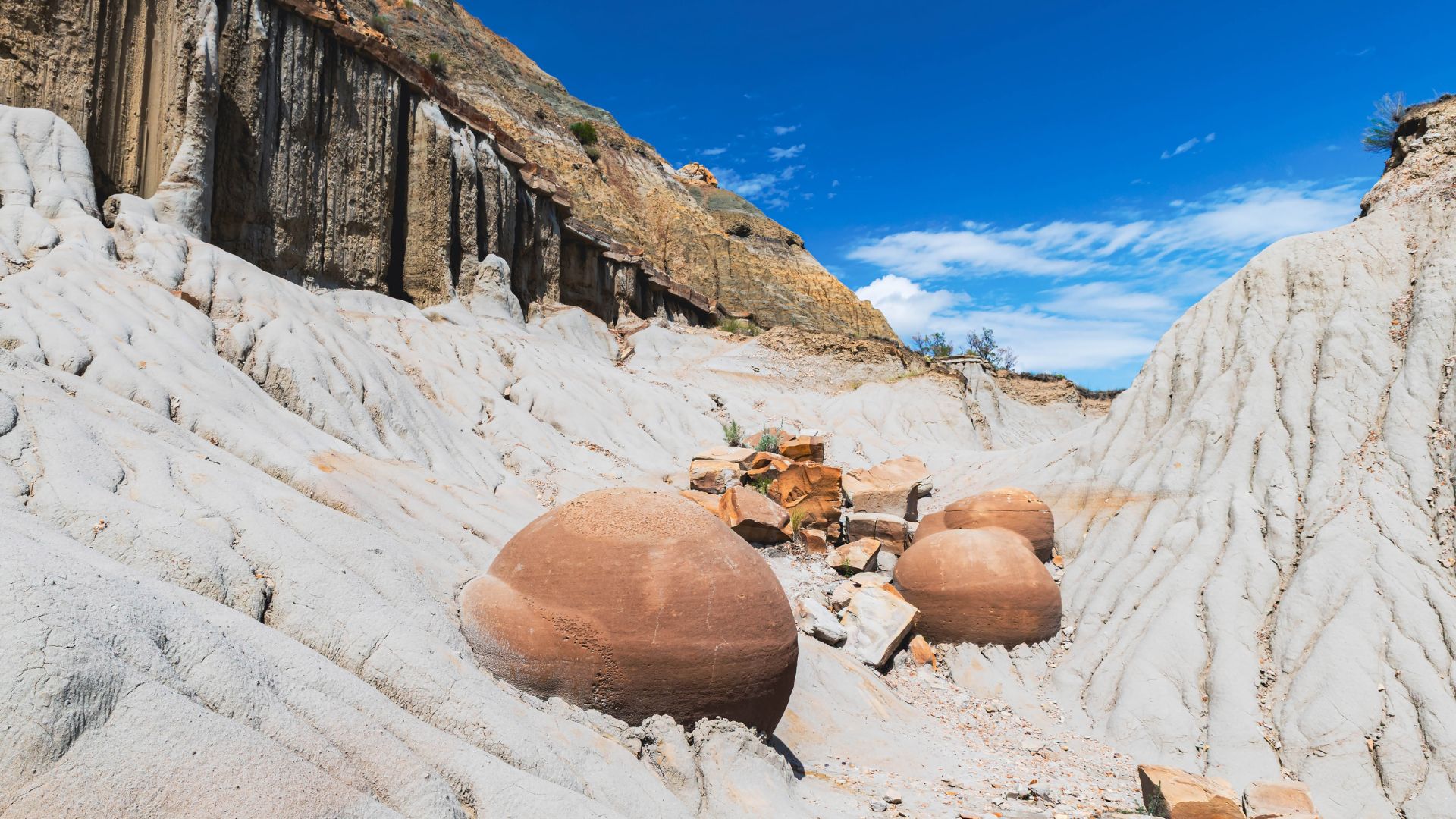 Vibrant cliffside view with spherical stone formations in China