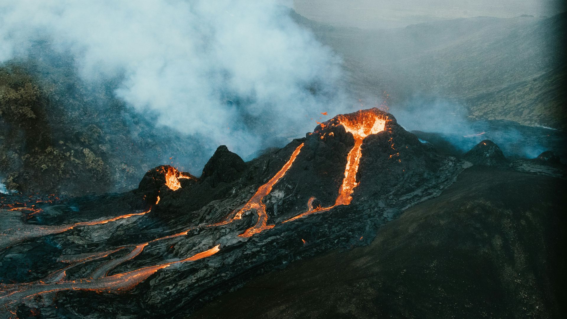 Aerial view of Campi Flegrei volcano surrounded by clouds in Italy