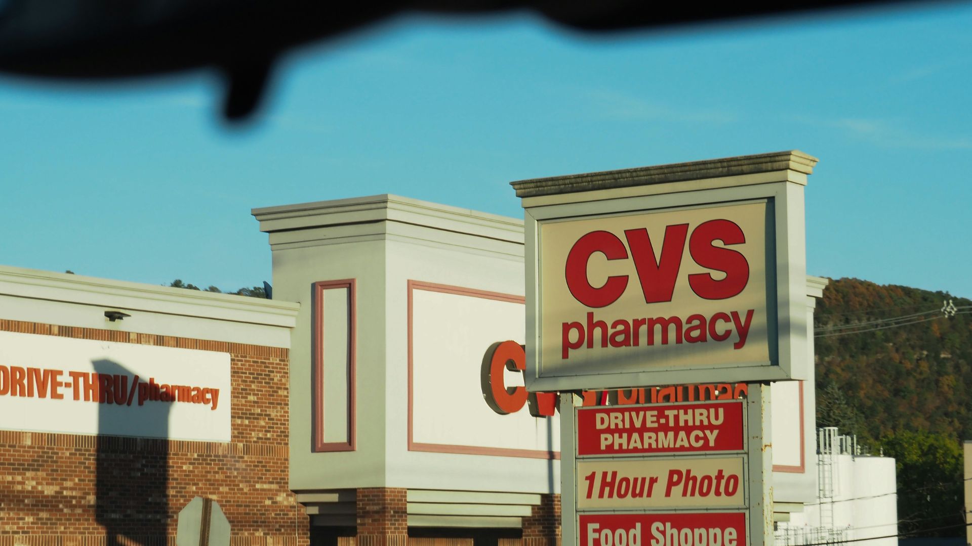 CVS Pharmacy sign in front of a store entrance