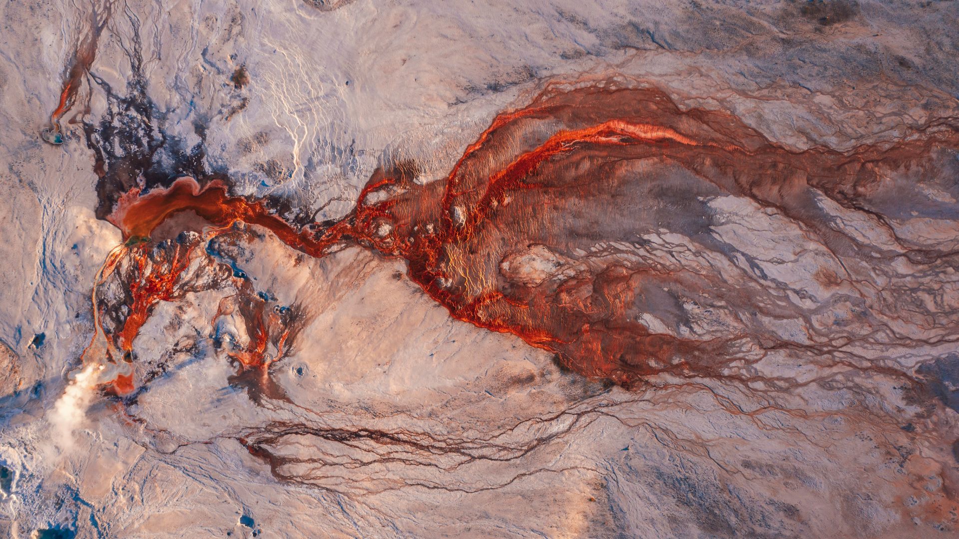 Abstract visual of swirling brown and white layers symbolizing planetary mantle convection