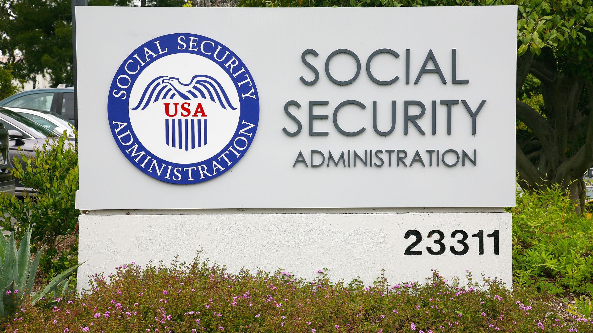 Senior man reviewing financial paperwork at home