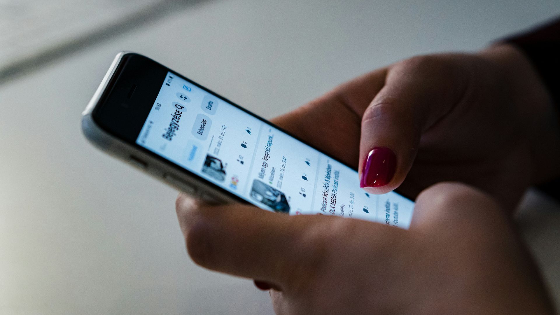 Person using a device to read a public statement online