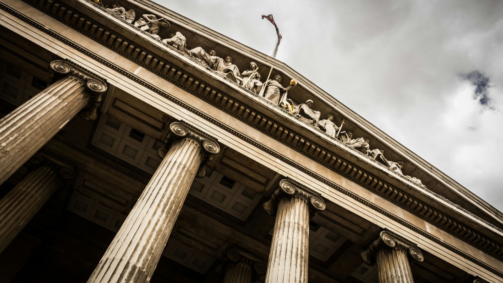 Low-angle view of a government building with tall columns