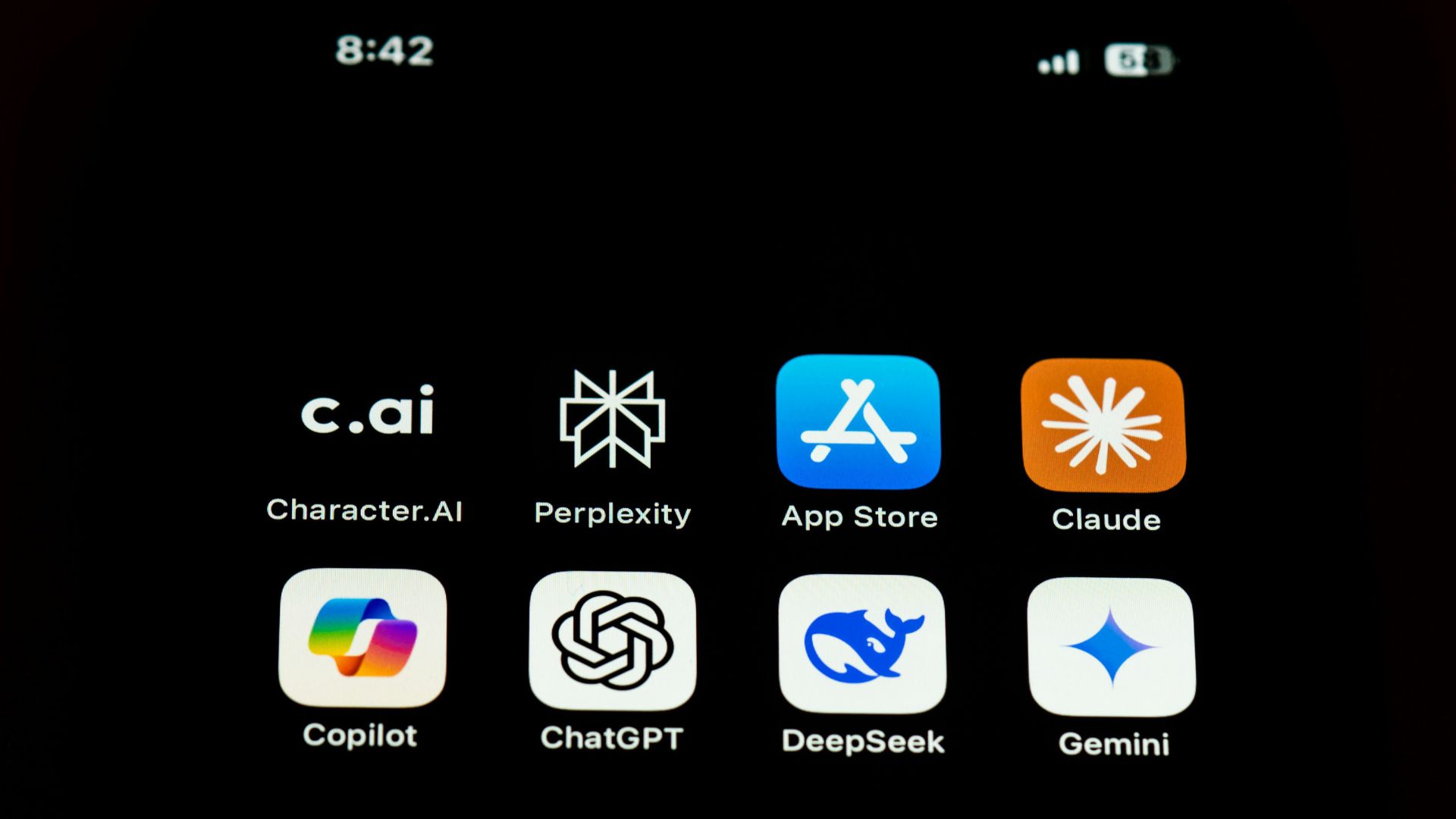 Smartphone screen showing app icons under bright light