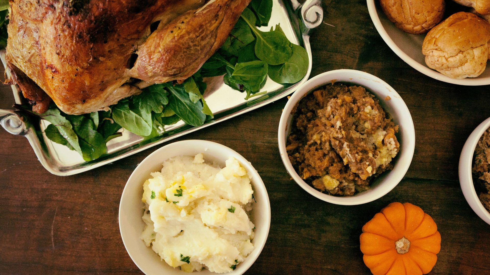 Bowl of rice with vegetables placed on a white table