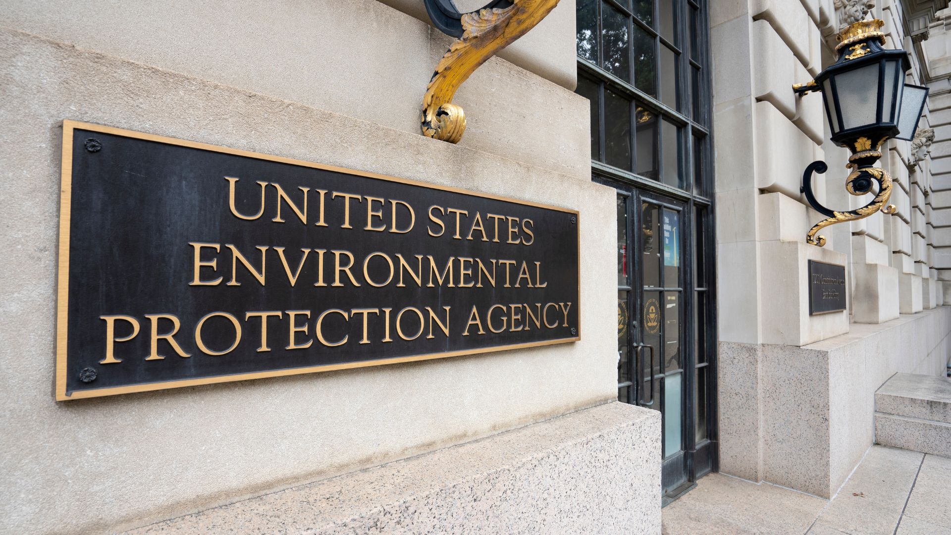 EPA headquarters building in Washington D.C. with flags at the entrance
