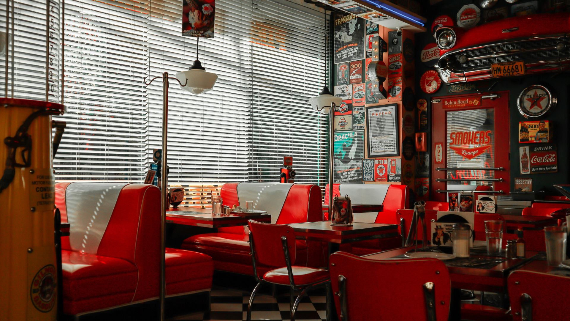 Red leather bench seating inside a quiet restaurant
