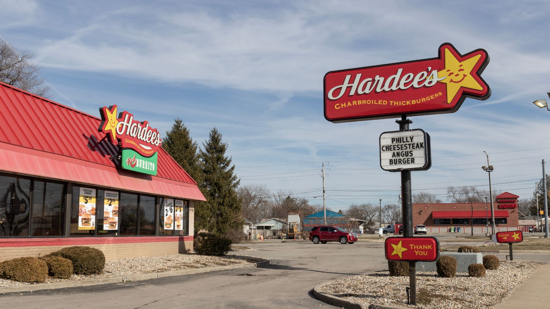 Hardee’s fast food restaurant exterior in Indianapolis with drive thru