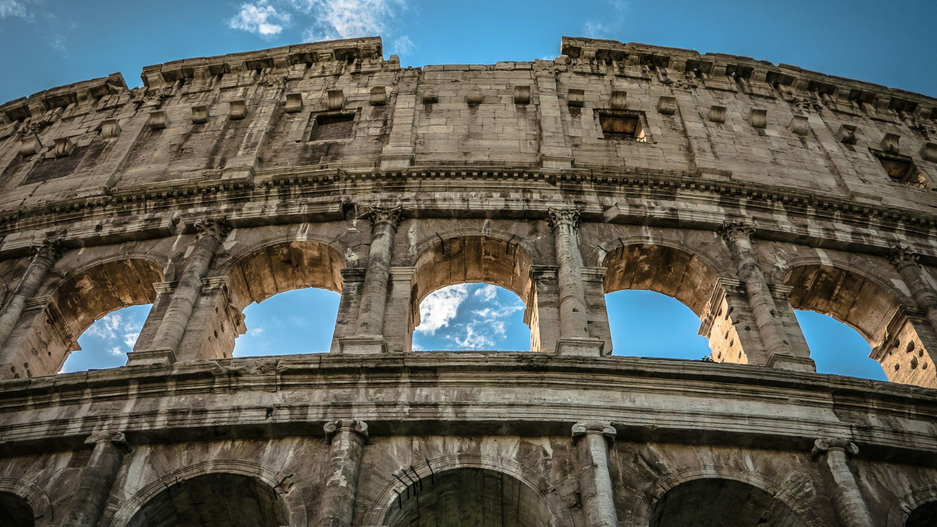 Exterior view of the Roman Colosseum in sunlight