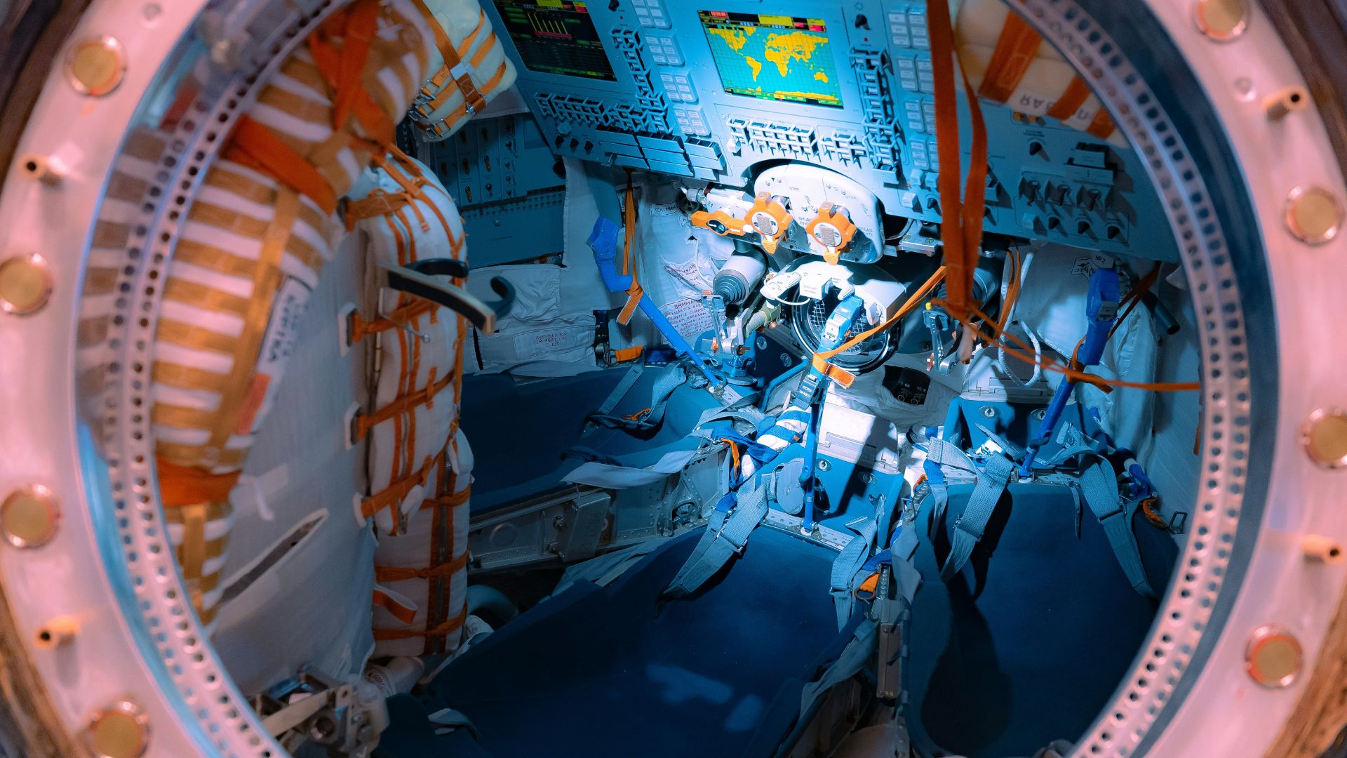 Interior view of a space station showing equipment and control panels