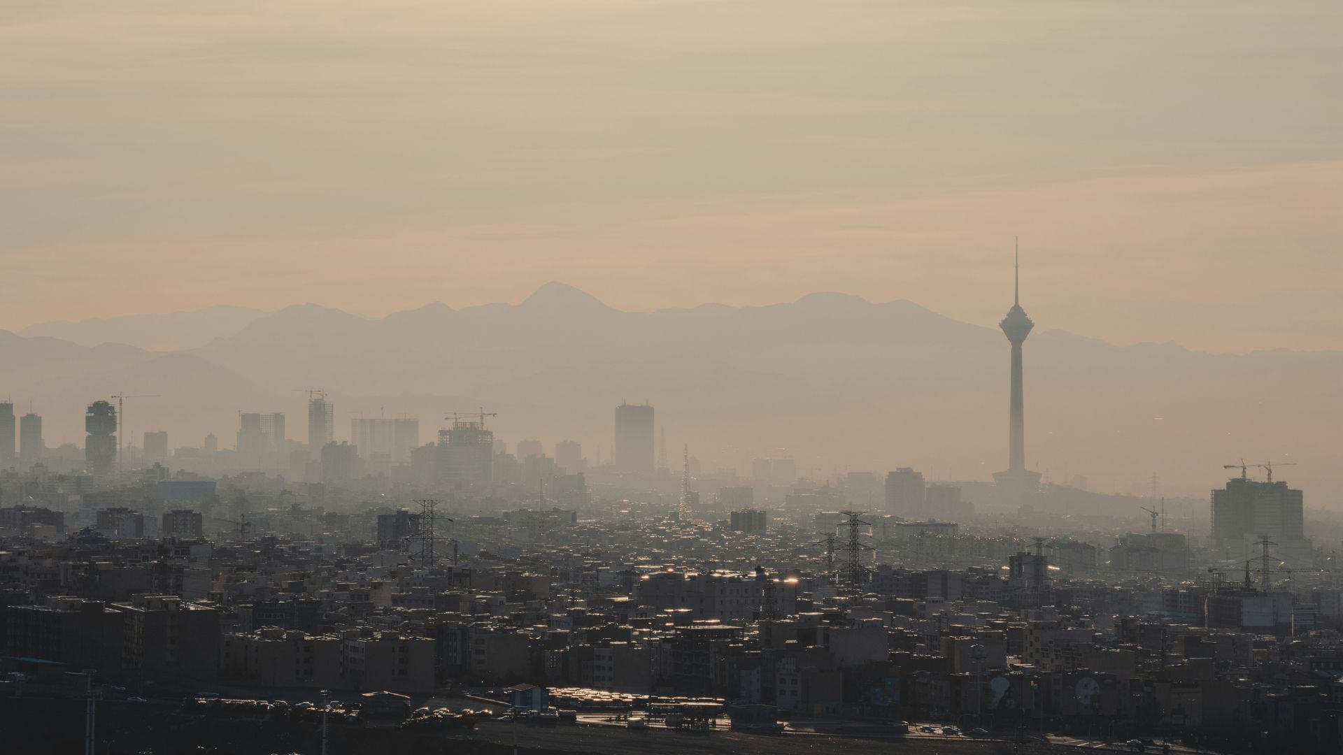City skyline under a pale daytime sky