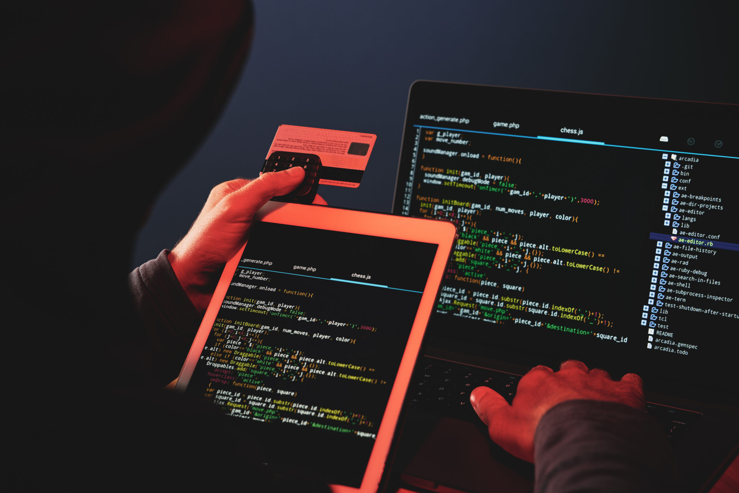Hackers hacking into credit card on computer