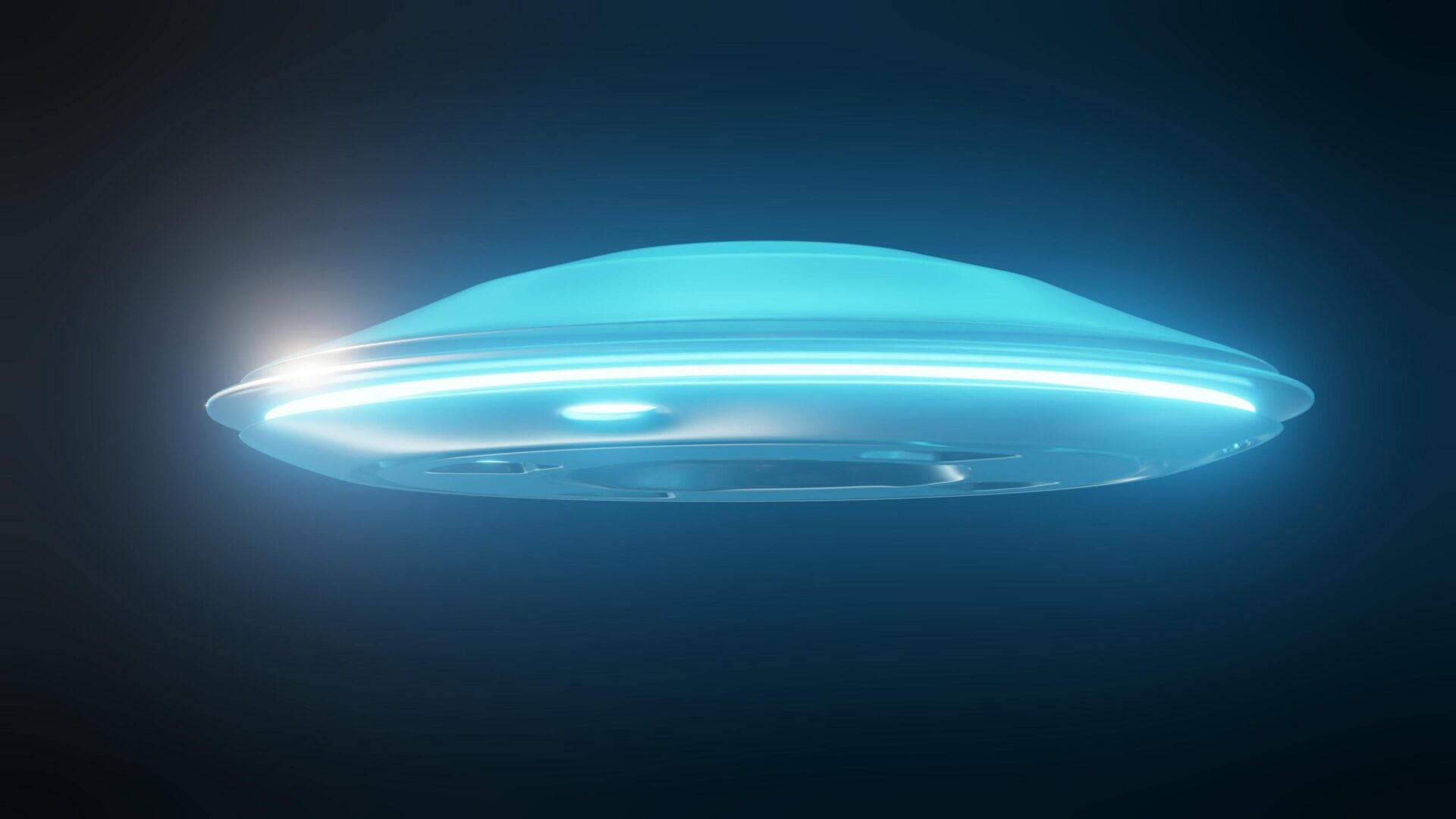 Futuristic flying saucer glowing with blue light against a dark background, evoking UFO and outer-space imagery.