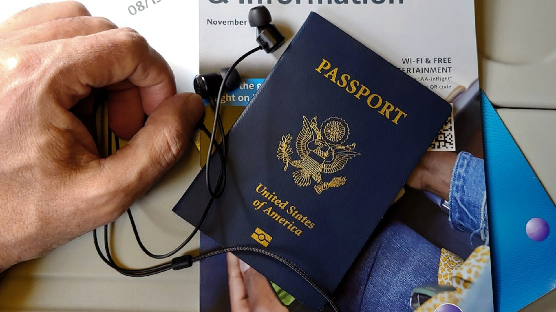 A U.S. passport with travel essentials