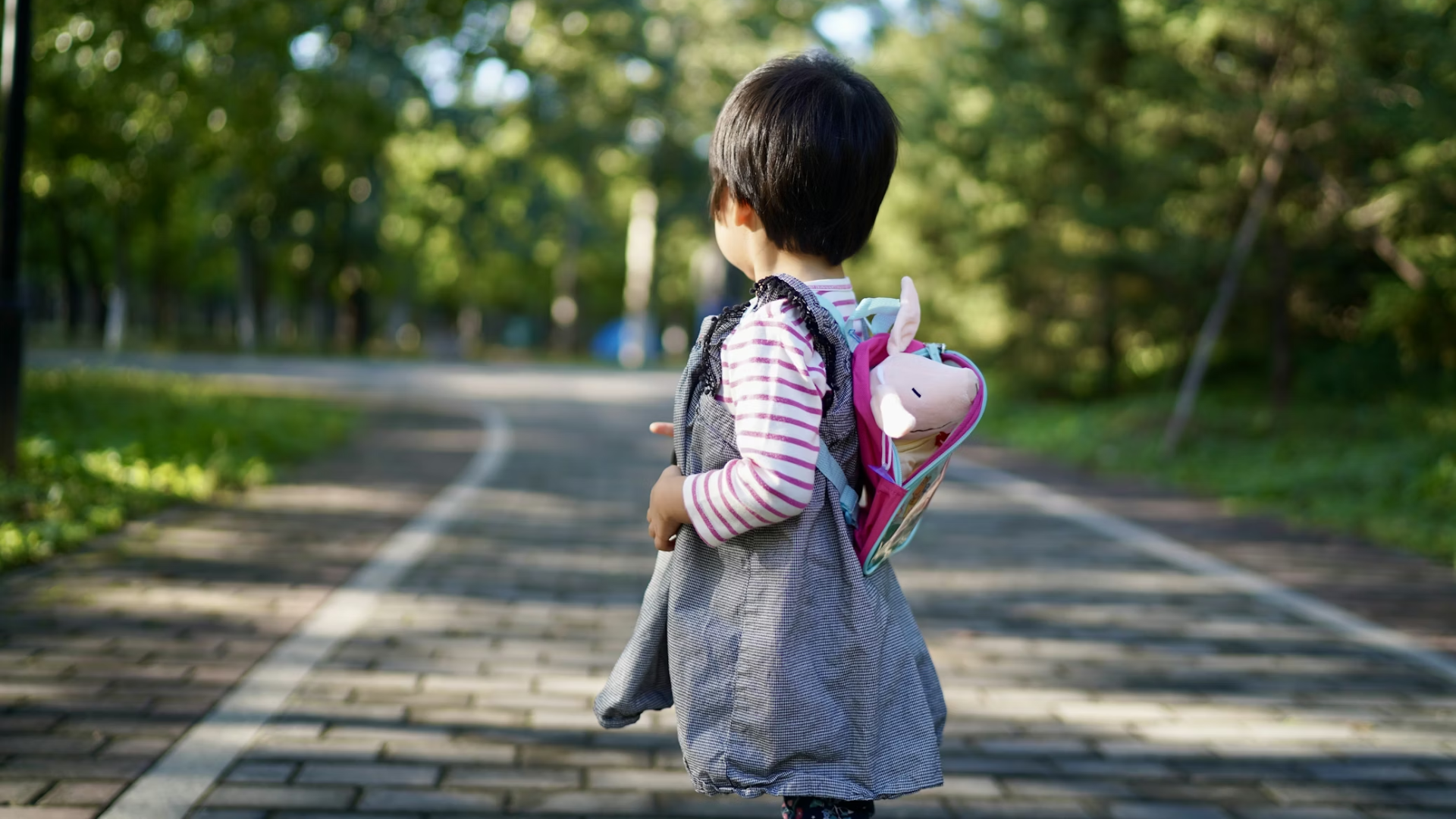 child walking in her own
