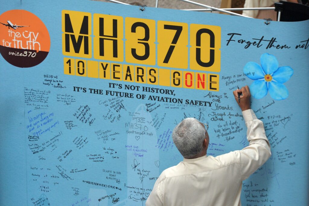 Memorial poster for flight MH370