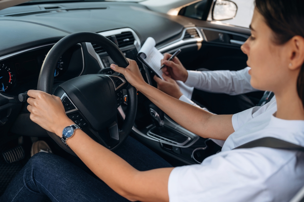 Woman with her driving instruction