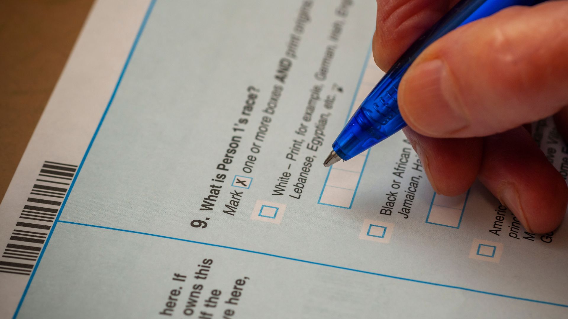 People walking past a federal government building in New York City during the 2020 census period