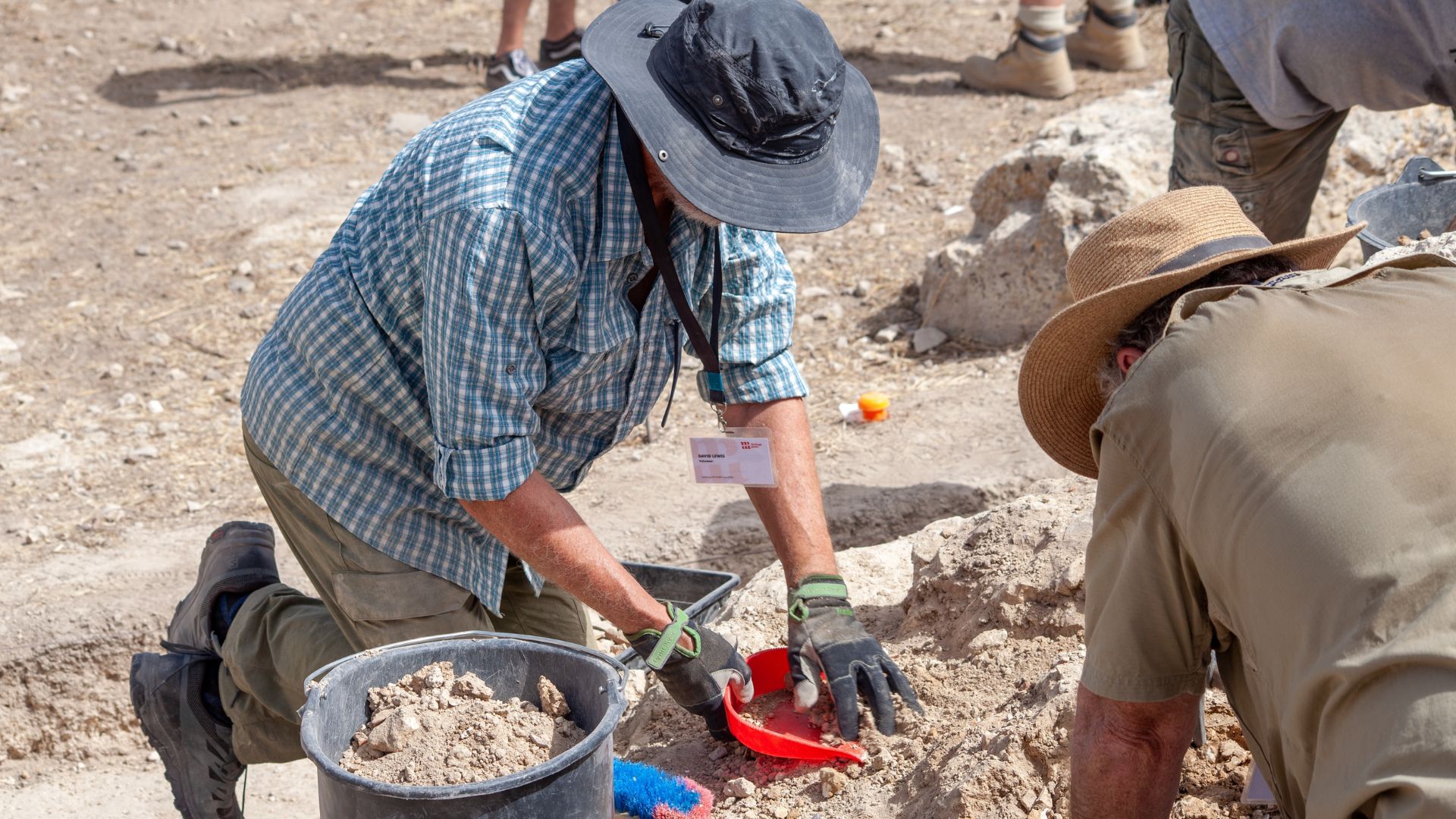 Archaeologists conducting excavation at an ancient stone site in Rabat, Malta
