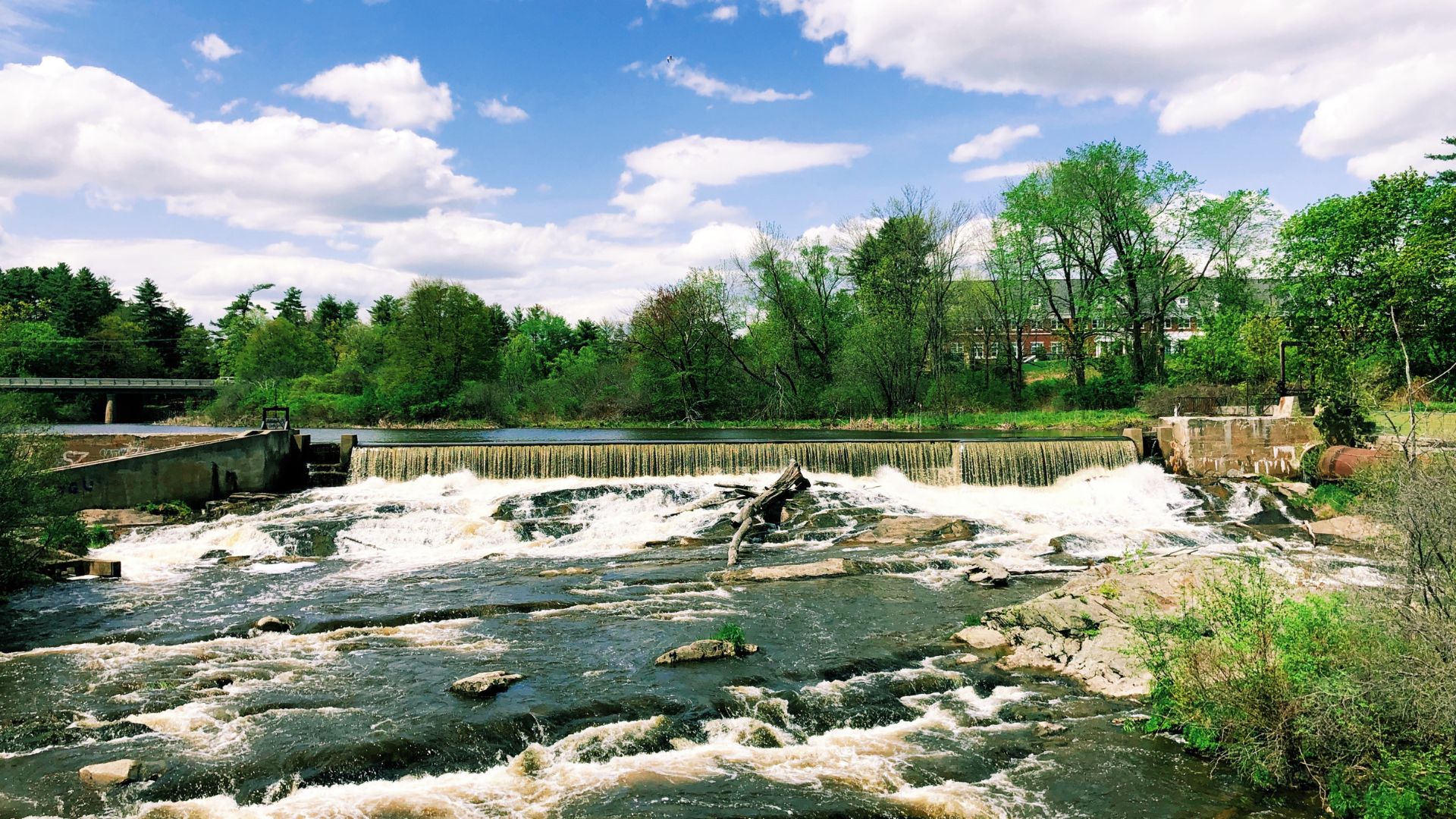 Bridge Street Dam with fast moving water in Yarmouth, Maine