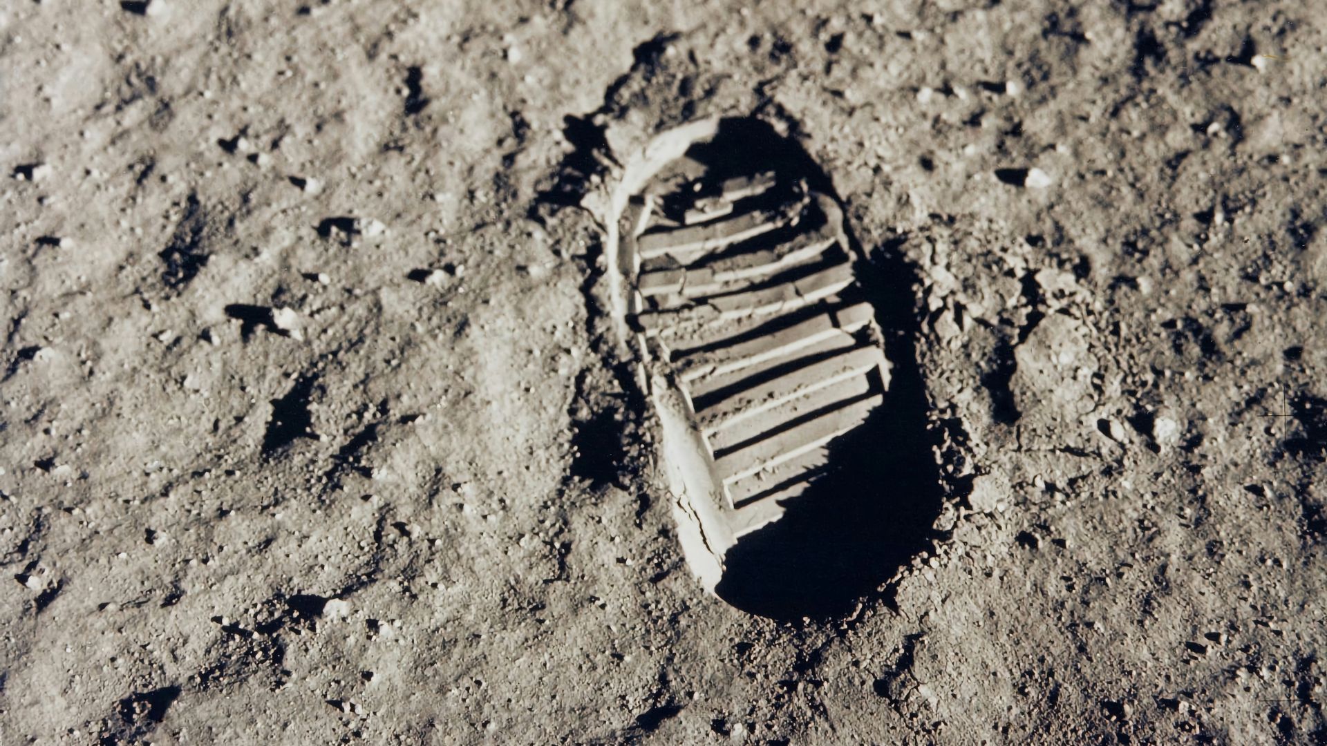 Astronaut footprint pressed into lunar regolith on the moon’s surface