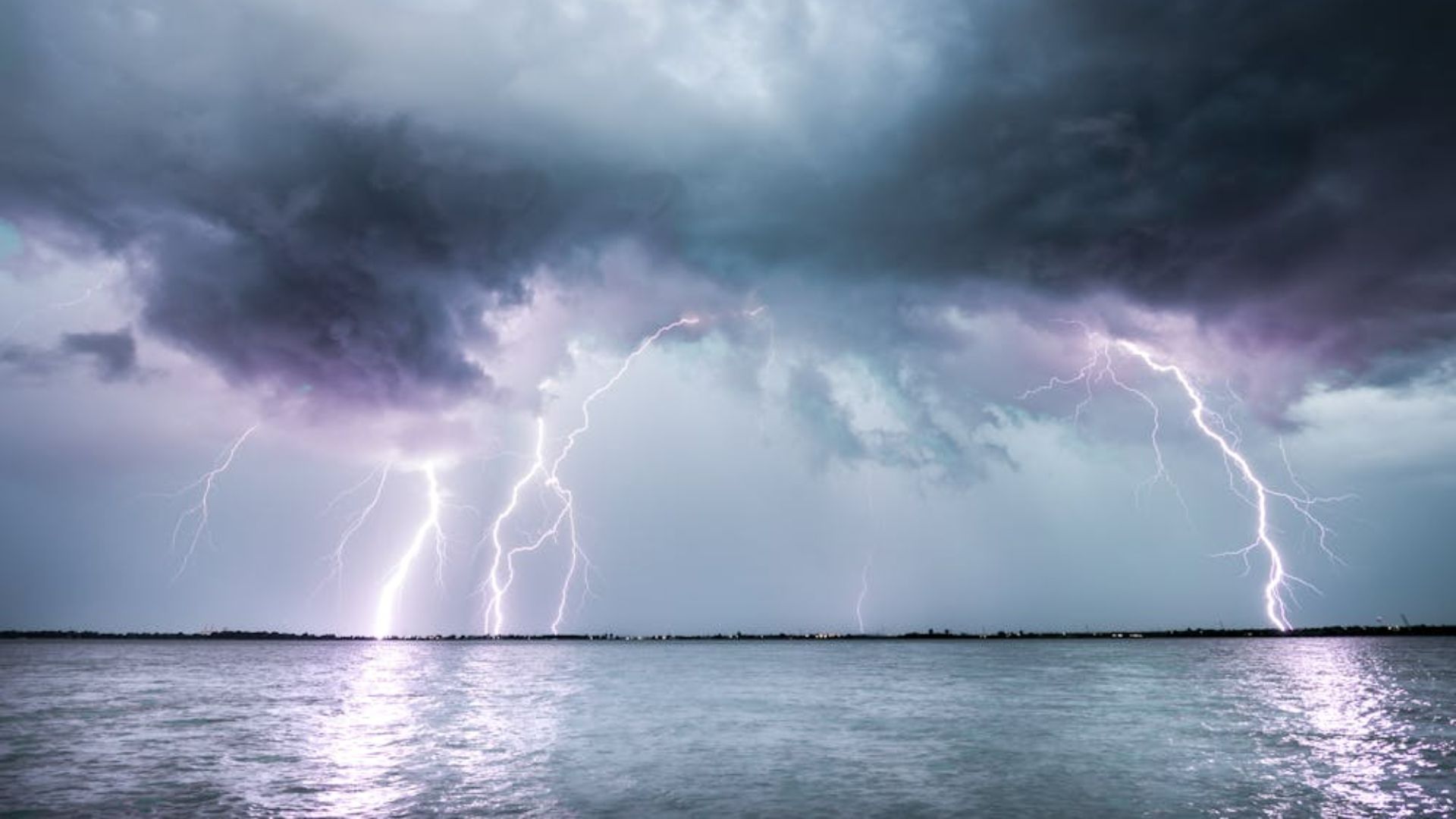 Lightning over a body of water