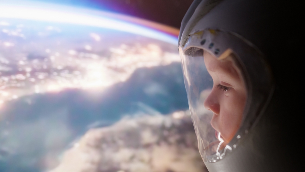 Baby watching to the earth from out space