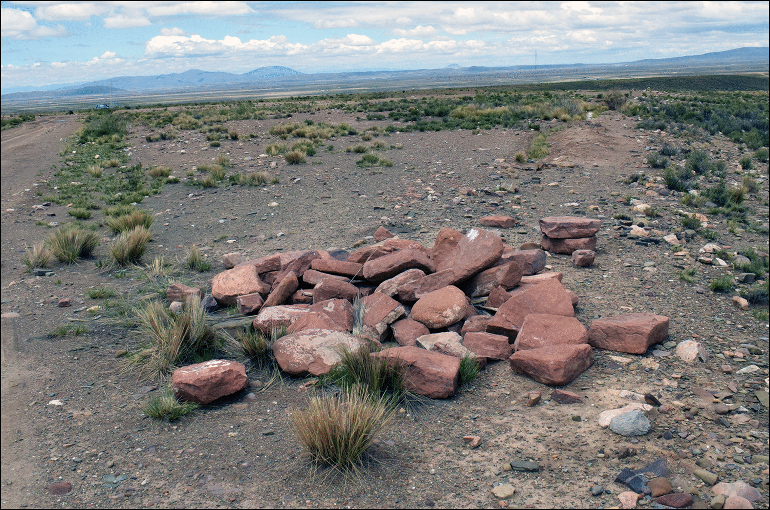 Accumulation of carved red sandstone near the north-western corner of Palaspata.