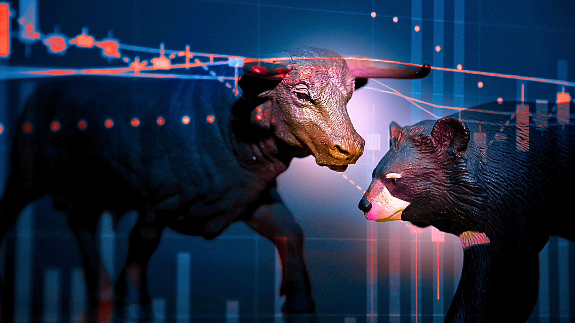 Bull and bear figures with stock market chart overlay in background.