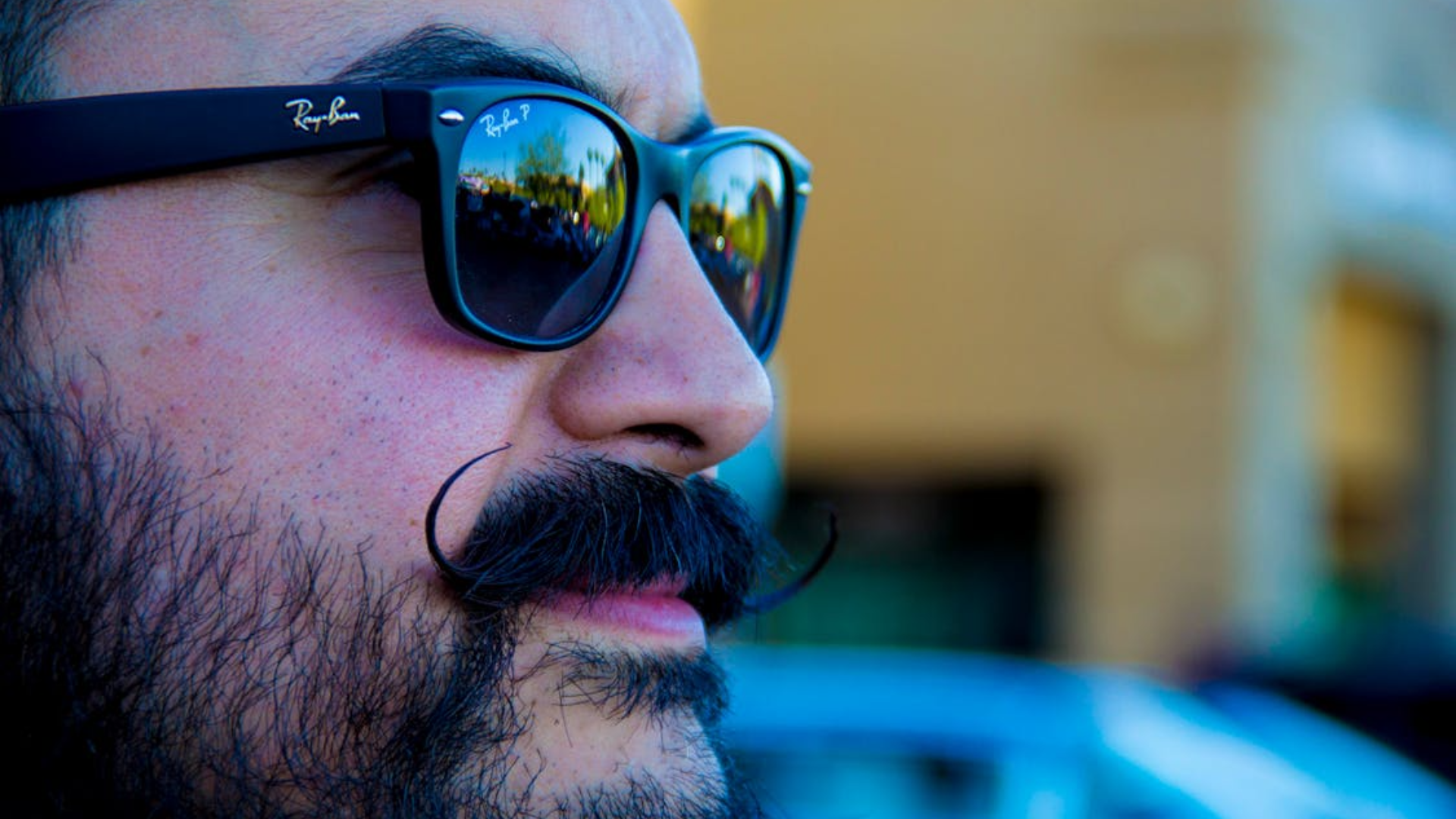 Man wearing Black Ray-Ban smart glasses.