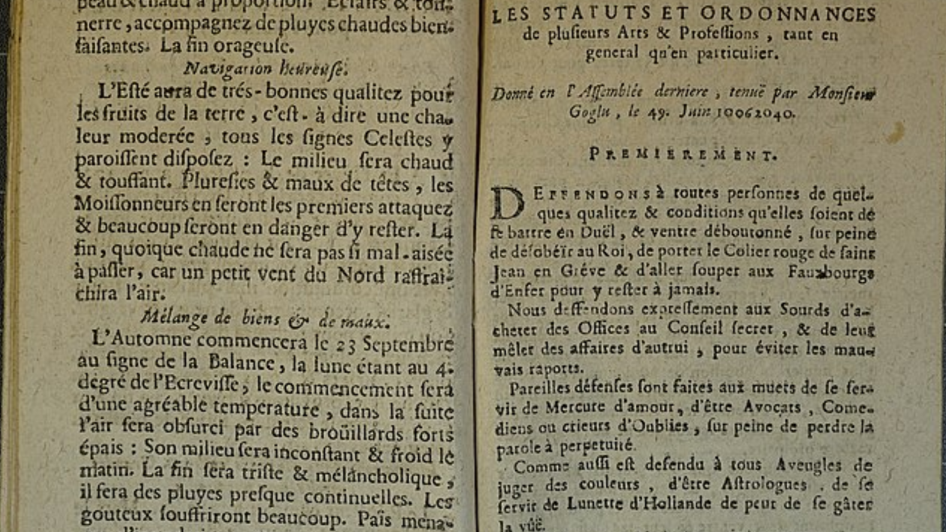 An open antique book containing various statutes and ordinances printed in traditional typography.